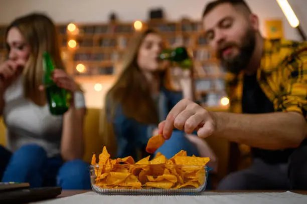 Photo of Bowl of nachos on a house party