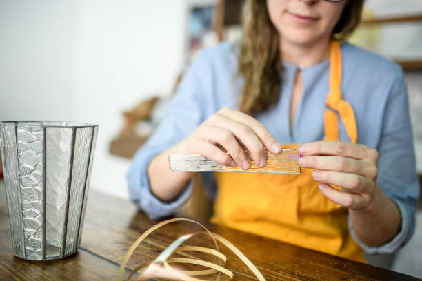 istock Glass artist craftswoman working in her studio 1323063479