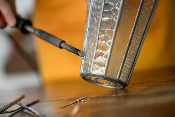 Glass artist craftswoman working in her studio