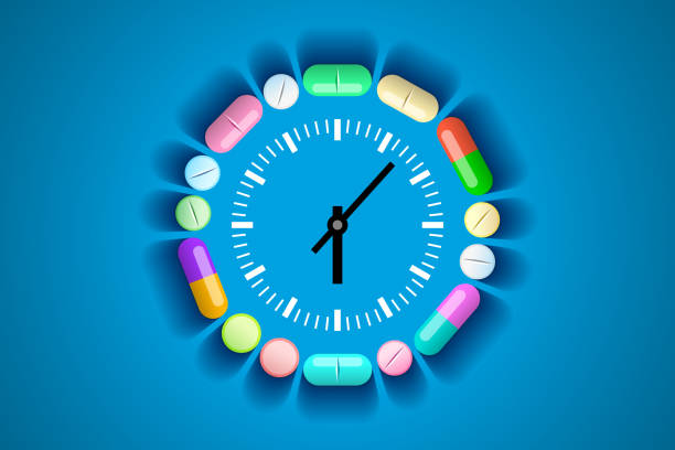 istock Clock and pills and tablets around it, healthcare and medical concept 1323067934