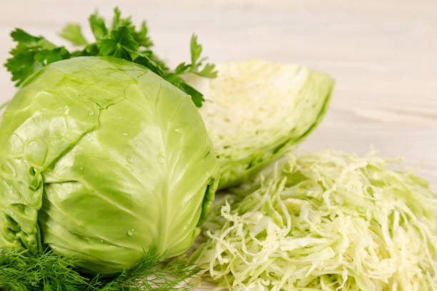 istock Fresh cabbage and green vegetables for salad 1323071152