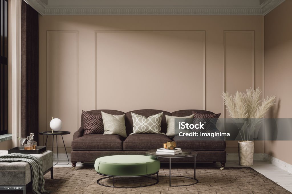 Cozy Bohemian Living Room Interior Bohemian living room interior with brown furnitures and beige walls. Living Room Stock Photo