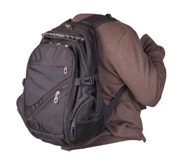 istock black backpack dressed in a knitted  sweater isolated on a white background. 1323074861