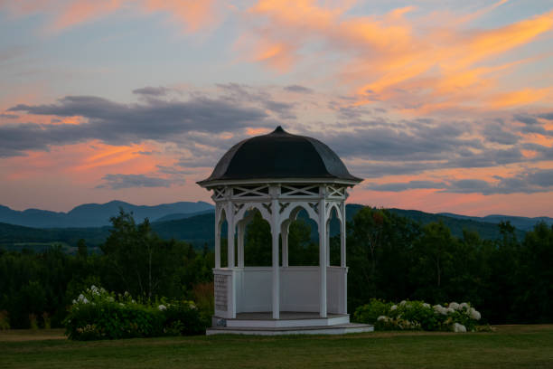 istock A wedding gazebo at sunset with mountains and beautiful clouds 1323077799