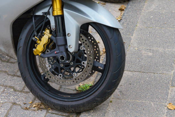 istock Close up of motorcycle front wheel. 1323077970
