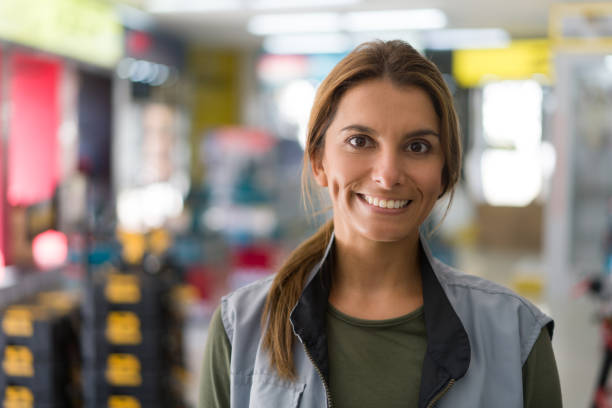 istock Happy saleswoman working at a hardware store 1323082666
