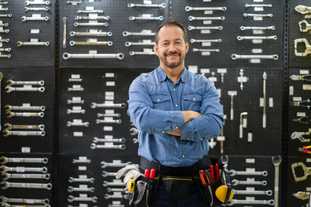 istock Salesman working at a hardware store selling tools 1323082752