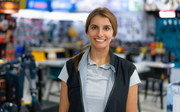 istock Saleswoman working at a hardware store and smiling 1323082784