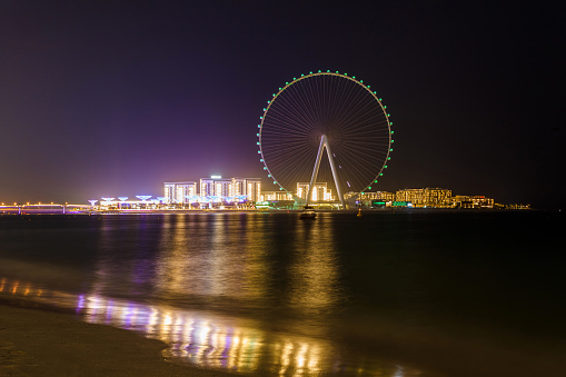 Dubai, UAE - april 19, 2021: night view on Bluewaters Island, Ain Dubai