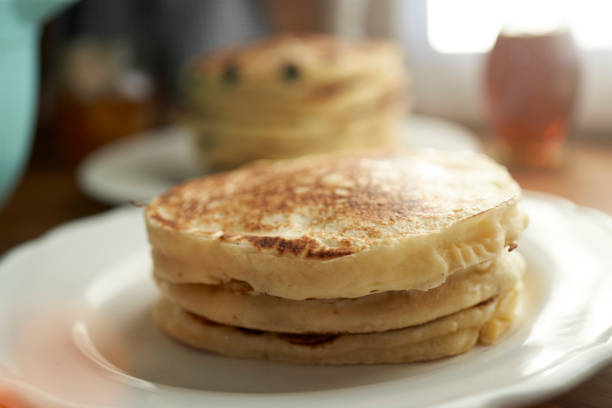 istock Stack of Blueberry Pancakes with Butter 1323084156