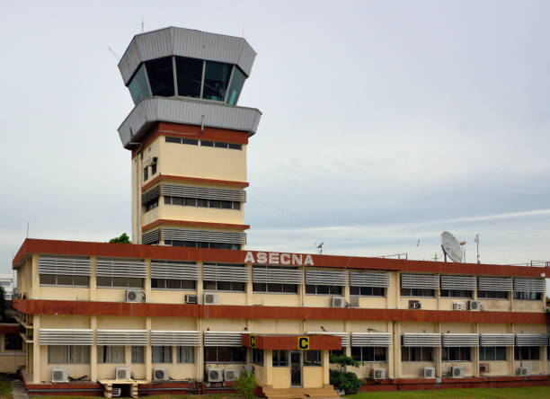 Abidjan Airport air traffic control tower - Félix-Houphouët-Boigny International Airport, Abidjan, Ivory Coast Abidjan, Ivory Coast / Côte d'Ivoire: air traffic control tower at Félix-Houphouët-Boigny International Airport aka Port Bouët Airport - operated by the Agency for Aerial Navigation Safety in Africa and Madagascar (ASECNA). abidjan airport stock pictures, royalty-free photos & images