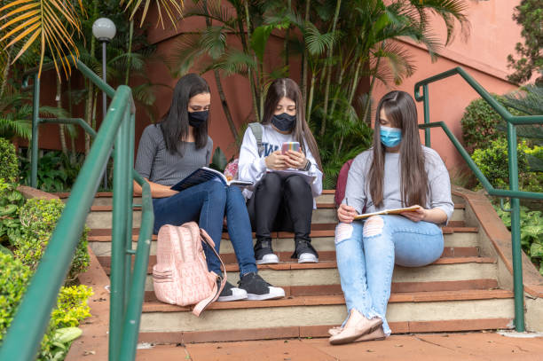 istock college students going back to university at covid times 1323094299