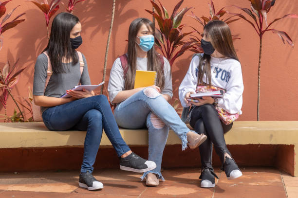 istock college students going back to university at covid times 1323094307