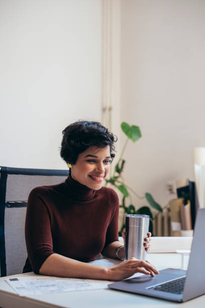 istock Happy Young Female Architect Working on Her Latest Design in Her Office 1323094588