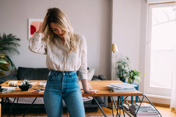 istock Beautiful Woman Posing in Home Office 1323098113