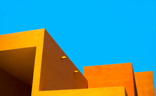 santa fe style: modern adobe building exterior detail, blue background - architectural detail imagens e fotografias de stock