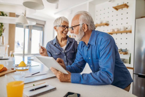 istock Senior couple at home 1323103753