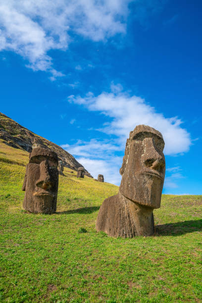 The ancient moai on Easter Island  of Chile The ancient moai on Easter Island 2,000 miles off the coast of Chile easter island stock pictures, royalty-free photos & images