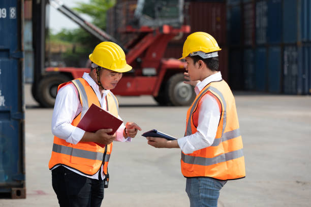 istock factory workers or engineers talking about work and project in factory workshop 1323139273