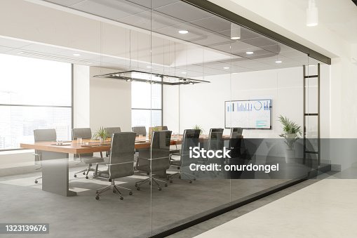 istock Outside View Of Empty Meeting Room With Table And Office Chairs 1323139676
