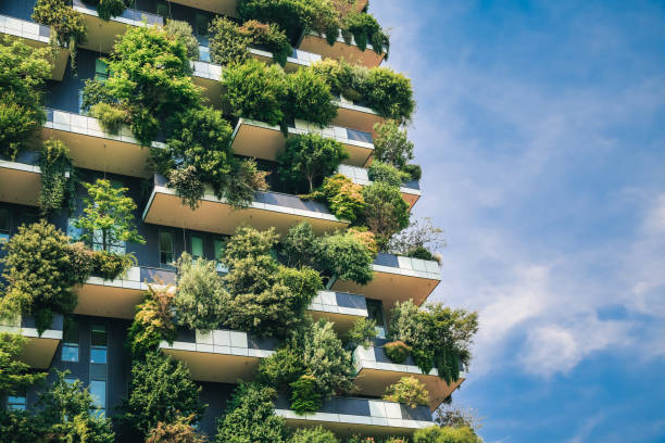 Sustainable architecture. Green futuristic skyscraper Bosco Verticale, vertical forest apartment building with gardens on balconies. Modern sustainable architecture in Porta Nuova district,  Milan, Italy. balcony photos stock pictures, royalty-free photos & images