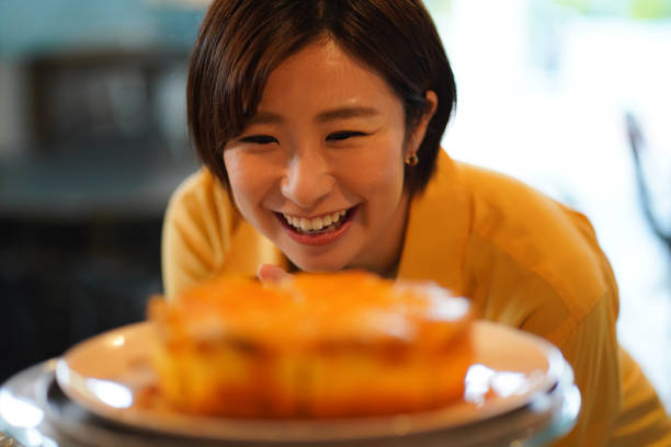 istock Woman choosing a cake 1323143837