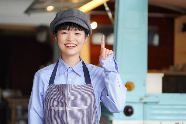 istock Image of a female clerk in a kitchen car 1323143863