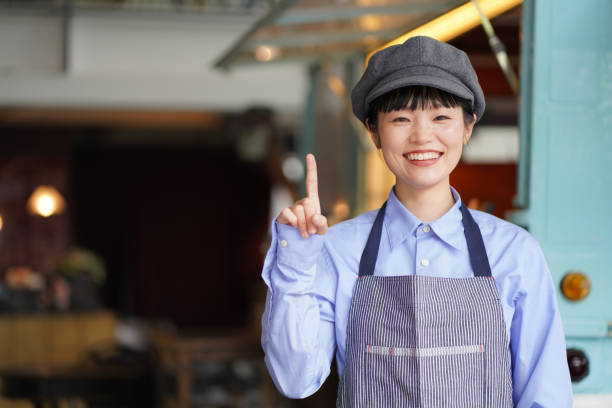 istock Image of a female clerk in a kitchen car 1323143871