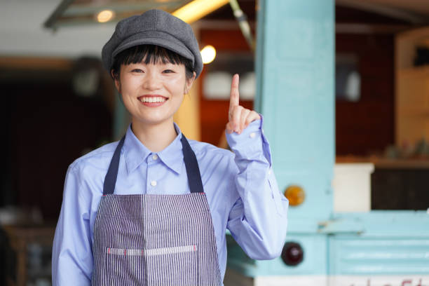 istock Image of a female clerk in a kitchen car 1323143911