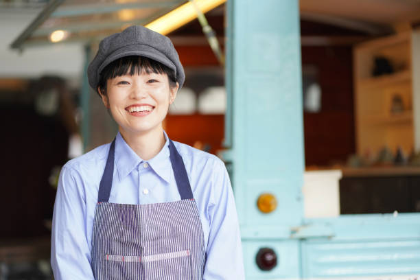 istock Image of a female clerk in a kitchen car 1323143918