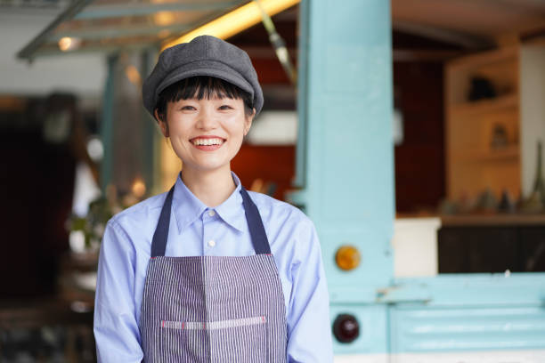 istock Image of a female clerk in a kitchen car 1323143989