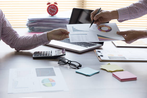 istock Business team dicuss about financial graph at working table in the office. 1323145896