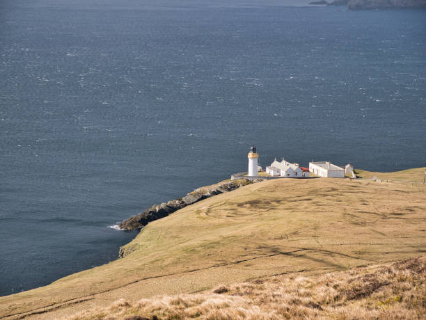 istock Designed by brothers David and Thomas Stevenson, Bressay Lighthouse on a sunny day, with Bressay Sound in the background. 1323154417