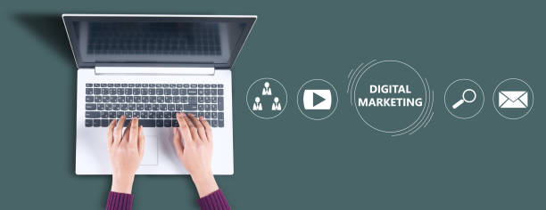 istock woman working computer and digital marketing icons 1323157451