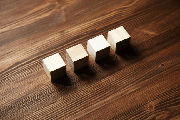 istock wooden block on wood table background 1323157529