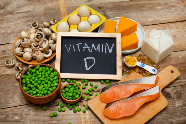 Foods rich in vitamin D Foods rich in vitamin D on a wooden table letter d stock pictures, royalty-free photos & images