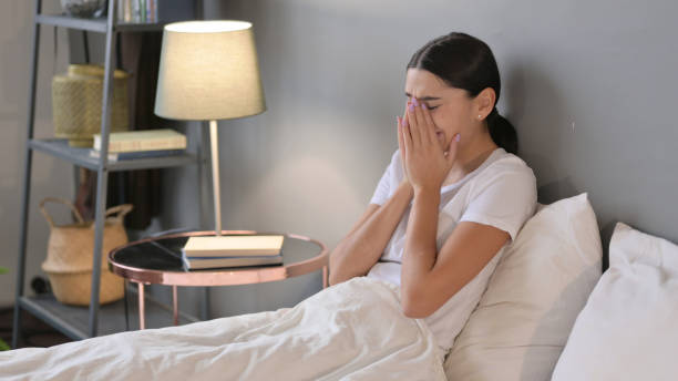 istock Upset Young Latin Woman Crying in Bed 1323162186