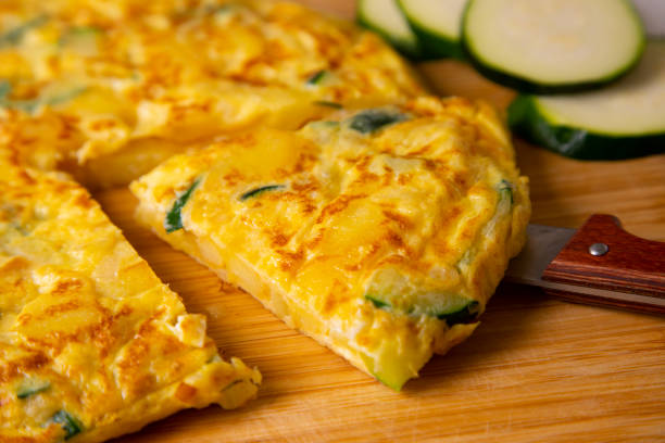 istock Traditional Spanish omelette with zucchini and potatoes. 1323163156