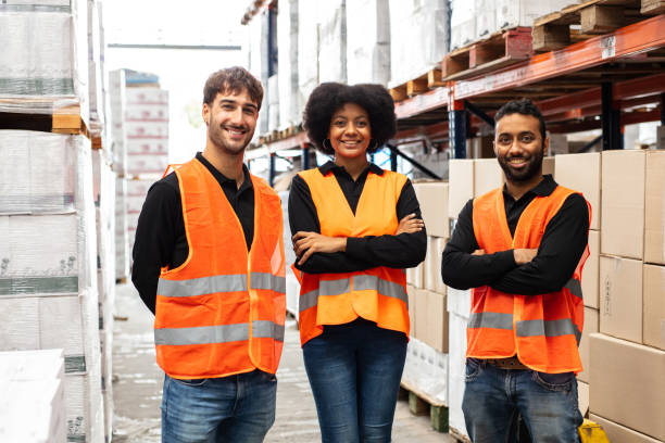 istock Logistics team together in distribution warehouse 1323165097