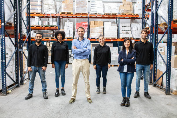 istock Portrait of successful logistics team in warehouse 1323165202