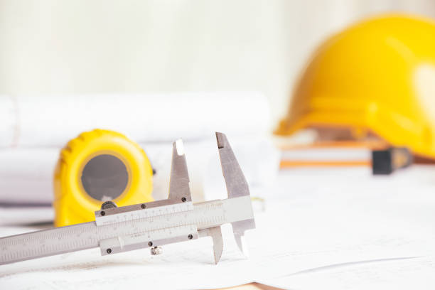 istock Work safety. Standard Construction site protective equipment on table wooden background, flat lay, copy space,safety first concepts. 1323166020