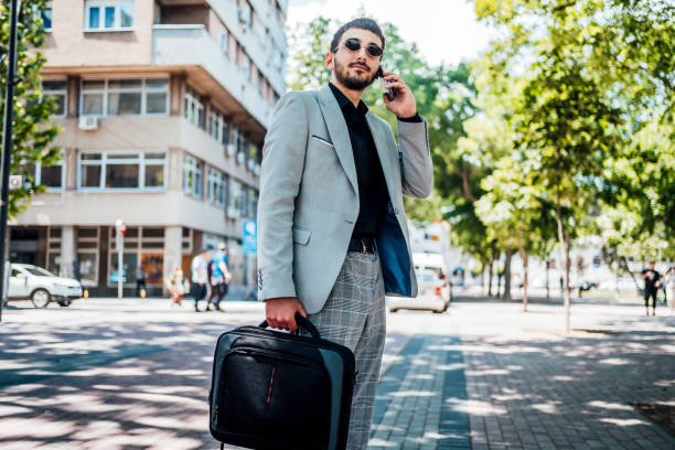 istock Young businessman talking on the phone 1323167721