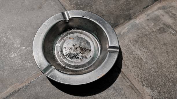 istock Iron ashtray on the floor 1323176652