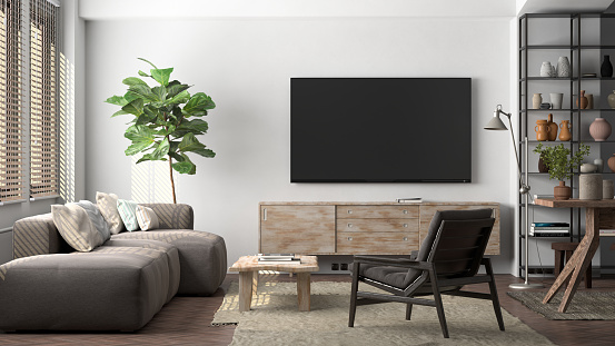TV screen mock up on the white wall in modern living room. 3d illustration