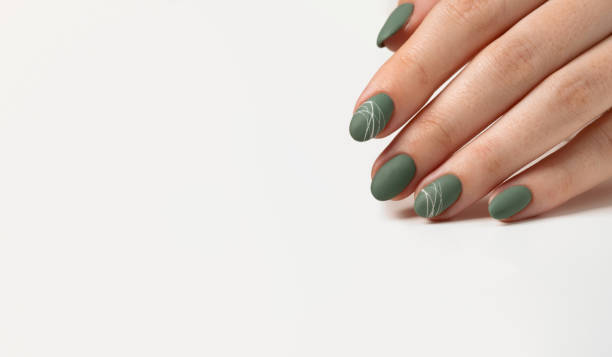 Hands Of A Young Woman With Green Olive Matte Nails On A Light Gray  Background Manicure Pedicure Beauty Salon Concept Copy Space For Text Or  Logo Gel Polish And Abstract White Spider