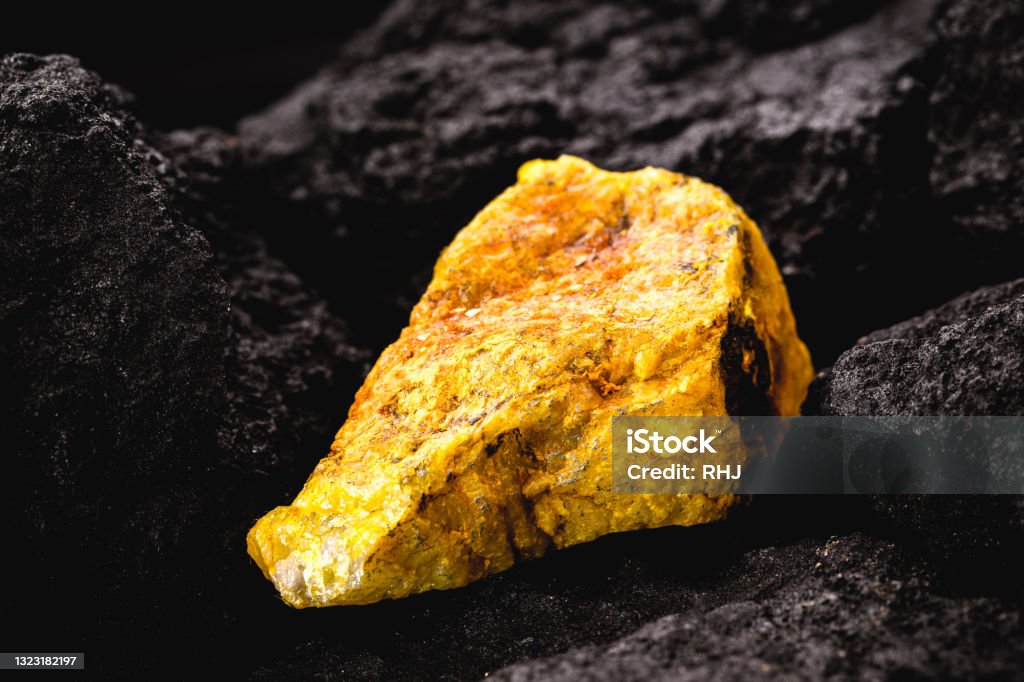 uranium ore in mine, mineral radiation concept, radioactive energy Uranium Stock Photo