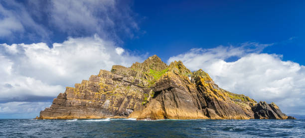 istock Skellig Lighthouse sticks out from behind off the rock on Skellig Michael island 1323188255
