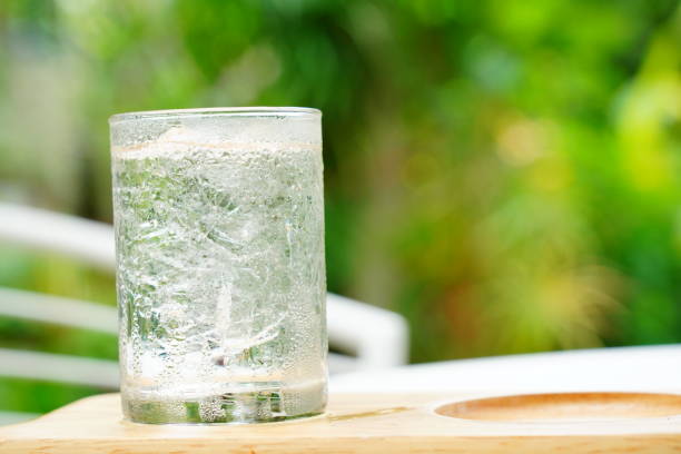 istock Glass of cool water on a table 1323188673