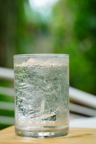 istock Glass of cool water on a table 1323188686