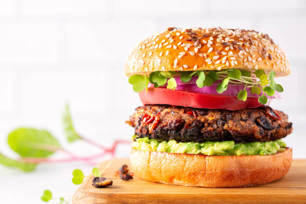 istock Plant based black bean burger in a light and bright environment 1323194312